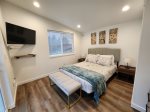 3rd floor loft style bedroom with a queen bed